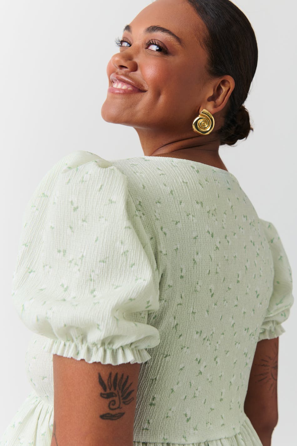 Toppur bundinn að framan