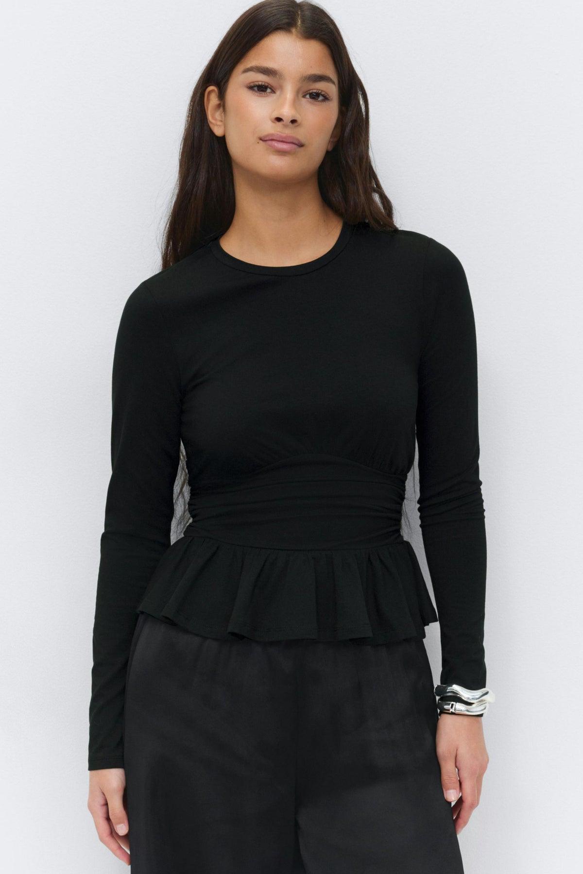 Peplum toppur