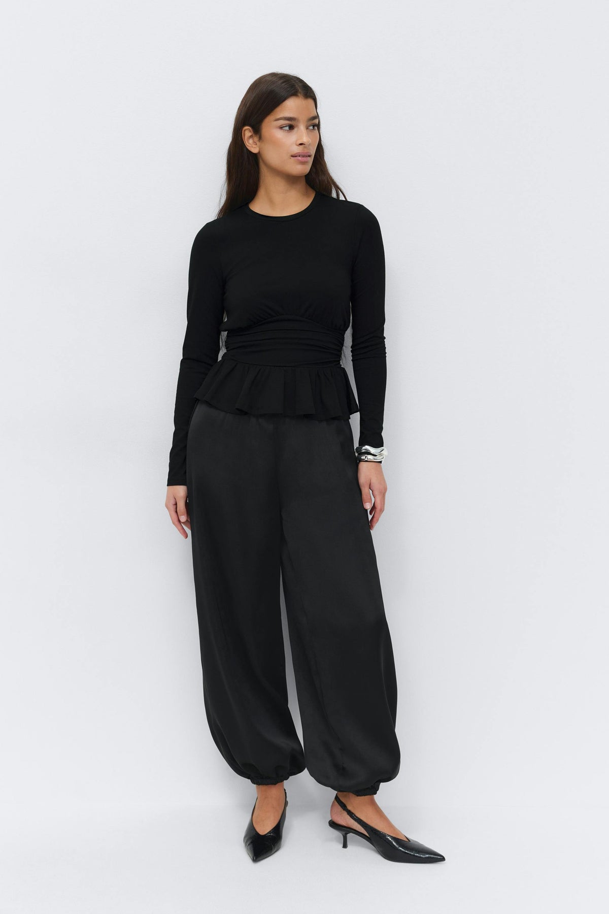 Peplum toppur