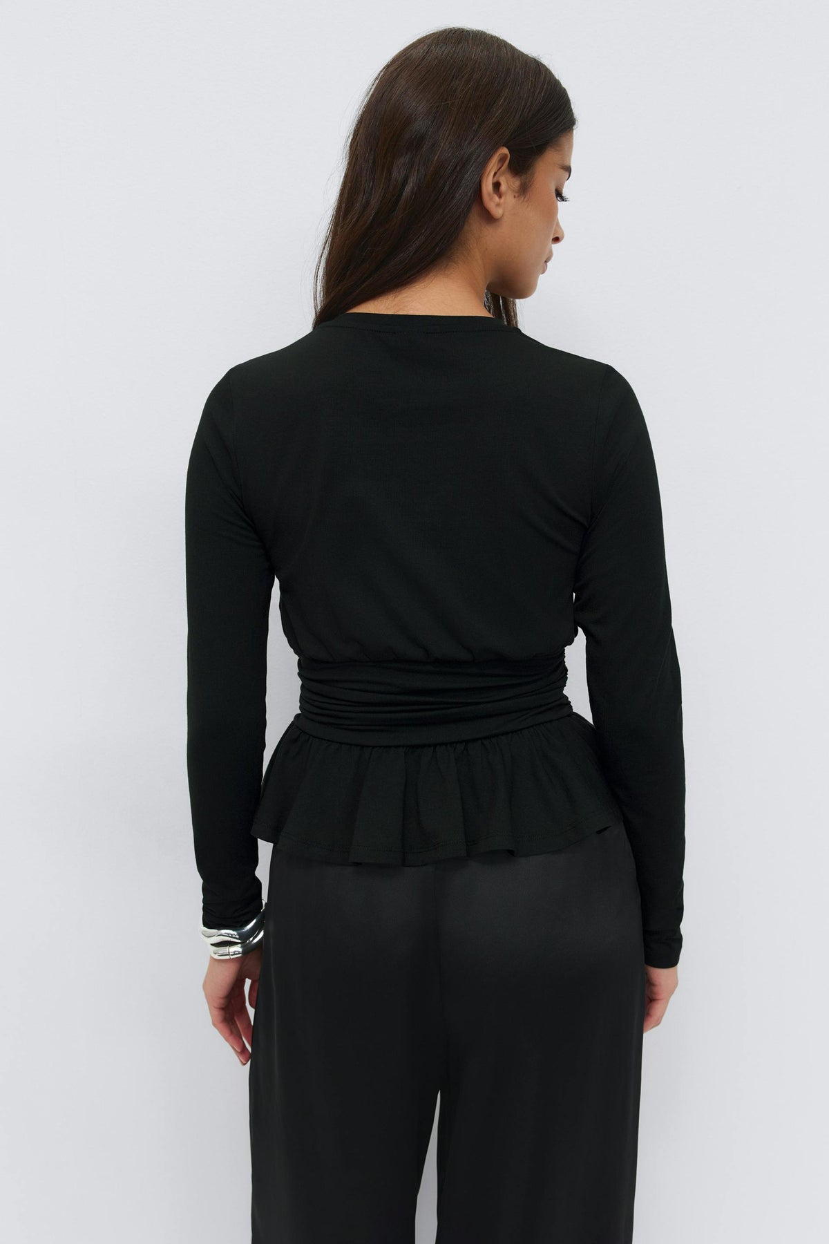 Peplum toppur